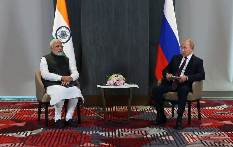 Russian President Vladimir Putin meets with India's Prime Minister Narendra Modi on the sidelines of the Shanghai Cooperation Organisation (SCO) leaders' summit in Samarkand on September 16, 2022. (Photo by Alexandr Demyanchuk / SPUTNIK / AFP)