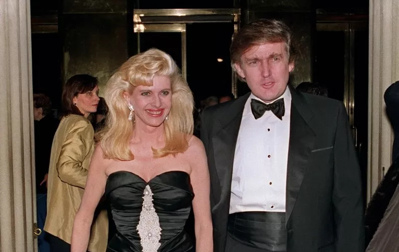 (FILES) This file photo taken on December 04, 1989 shows Billionaire Donald Trump and his wife Ivana arriving at a social engagement in New York.  
Donald Trump said on November 9, 2016 he would bind the nation's deep wounds and be a president "for all Americans," as he praised his defeated rival Hillary Clinton for her years of public service. / AFP PHOTO / SWERZEY