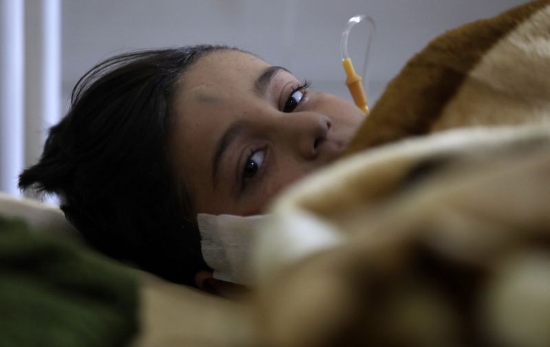 A child injured in a deadly earthquake lies in a bed at a hospital in Afrin in Syria's rebel-held part of Aleppo province, on February 9, 2023. - The 7.8-magnitude quake early on February 6 has killed more than 17,000 people in Turkey and war-ravaged Syria, according to officials and medics in the two countries, flattening entire neighbourhoods. (Photo by Bakr ALKASEM / AFP)