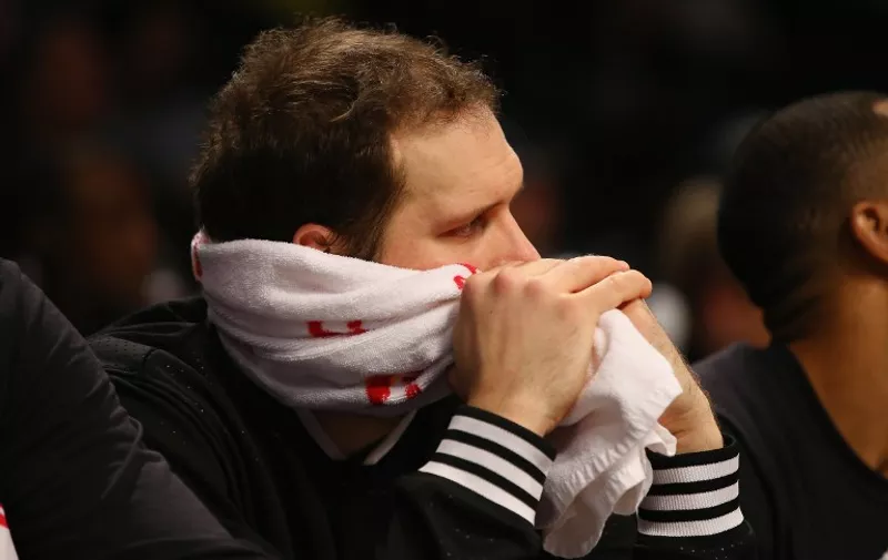 NEW YORK, NY - JANUARY 06: Bojan Bogdanovic #44 of the Brooklyn Nets looks on in the final seconds of their 91-74 loss against the Toronto Raptors during their game at the Barclays Center on January 6, 2016 in New York City. NOTE TO USER: User expressly acknowledges and agrees that, by downloading and/or using this Photograph, user is consenting to the terms and conditions of the Getty Images License Agreement.   Al Bello/Getty Images/AFP