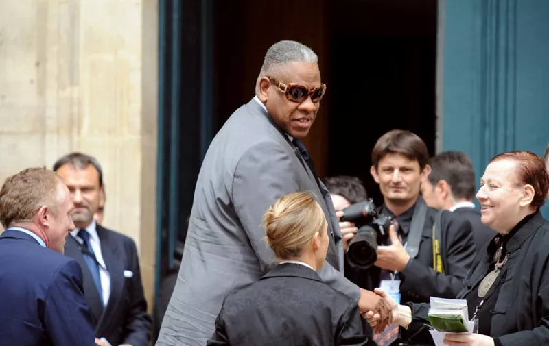 Vogue Editor-at-Large Andre Leon Talley arrives on June 5, 2008 at the Saint-Roch church in Paris, to attend the funeral mass held by father Roland Letteron for fashion designer Yves Saint-Laurent. Saint Laurent, one of the 20th century's greatest couturiers, credited for revolutionising women's wardrobes, died on June 1, aged 71 of a brain tumour. AFP PHOTO BERTRAND LANGLOIS (Photo by BERTRAND LANGLOIS / AFP)