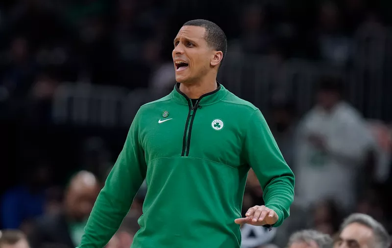 Boston Celtics interim head coach Joe Mazzulla shouts from the bench in the first half of an NBA basketball game against the Memphis Grizzlies, Sunday, Feb. 12, 2023, in Boston. (AP Photo/Steven Senne)