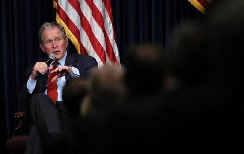 SIMI VALLEY, CA - MARCH 01: Former U.S. President George W. Bush speaks during a discussion about his new book "Portraits of Courage: A Commander in Chief's Tribute to America's Warriors" at the Ronald Reagan Presidential Library on March 1, 2017 in Simi Valley, California. Former U.S. President George W. Bush spoke in conversation with Frederick J. Ryan, Jr., Chairman of the Board of Trustees for the Ronald Reagan Presidential Foundation and Institute, about his new book of paintings and stories by honoring the sacrifice and courage of America's military veterans.   Justin Sullivan/Getty Images/AFP