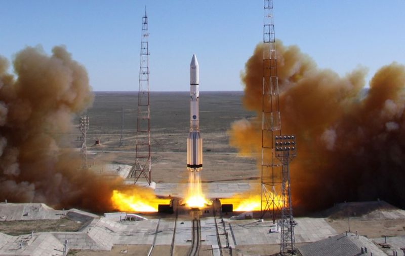 (FILES) A file picture taken on April 28, 2014 shows a Russian-built Proton rocket with Russian relay satellite Luch-5V and the Kazakh communication satellite KazSat-3 aboard blasting off from a launch pad in the Russian leased Kazakhstan's Baikonur cosmodrome. Russia on May 16, 2015 lost a Mexican satellite on launch just hours after a glitch with a manoeuvre involving the International Space Station, the latest in a string of embarrassing failures for its troubled space programme.  AFP PHOTO