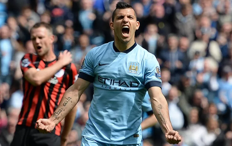 Manchester City's Argentinian striker Sergio Aguero celebrates his third goal during the English Premier League football match between Manchester City and Queens Park Rangers at the Etihad Stadium in Manchester, northwest England, on May 10, 2015.  AFP PHOTO / OLI SCARFF

RESTRICTED TO EDITORIAL USE. No use with unauthorized audio, video, data, fixture lists, club/league logos or live services. Online in-match use limited to 45 images, no video emulation. No use in betting, games or single club/league/player publications