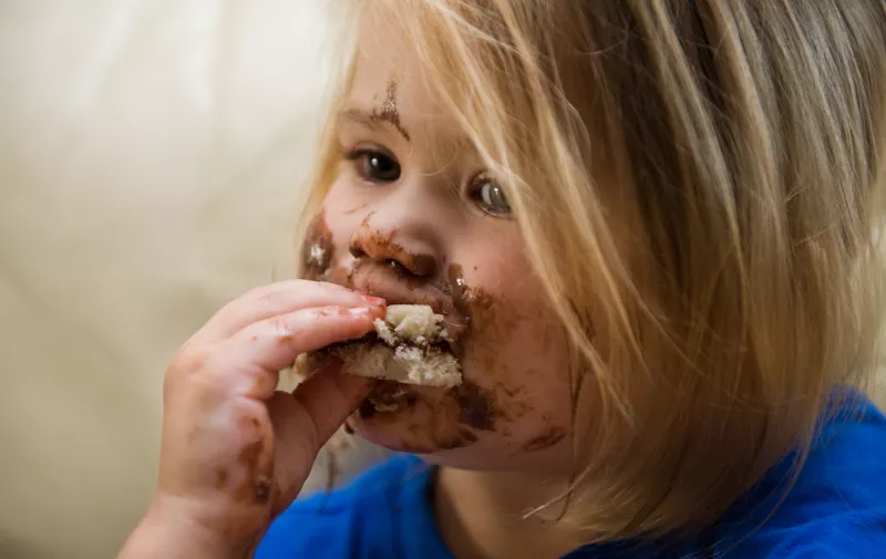 girl is eating, girl, eat, chocolate, meal, horizontal