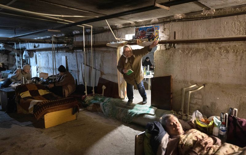 LUGANSK REGION, UKRAINE - APRIL 17, 2022: Civilians stay in a bomb shelter in the city of Rubizhne. With tension escalating in Donbass in February, the Russian Armed Forces launched a special military operation in Ukraine in response to appeals for help from the Donetsk and Lugansk People's Republics. Stanislav Krasilnikov/TASS,Image: 683805004, License: Rights-managed, Restrictions: , Model Release: no, Credit line: Profimedia