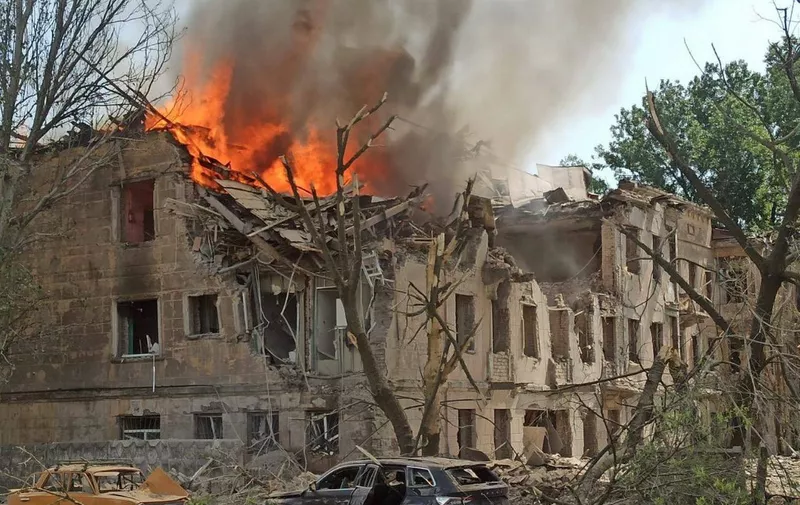 This handout photograph released on May 26, 2023 by the Telegram account of Serhiy Lysak, the head of the Dnipropetrovks Regional Military Administration, shows the fire at a medical facility, the site of a missile strike, in the city of Dnipro, amid the Russian invasion of Ukraine. (Photo by Handout / Telegram account of Serhiy Lysak, head of the Dnipropetrovks regional military administration / AFP)