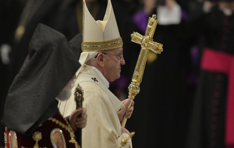 Pope Francis (C) leaves at the end of a mass for Armenian Catholics marking 100 years since the mass killings of Armenians under the Ottoman Empire, on April 12, 2015 at St Peter&#8217;s basilica in Vatican. Pope Francis faces a key diplomatic test today as he marks the centenary of the mass killings of Armenians [&hellip;]