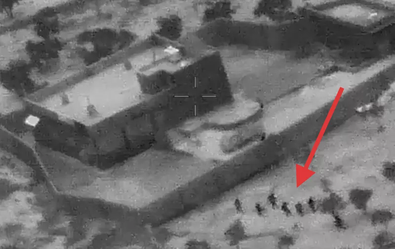 This still image from video released by the US Department of Defense on October 30, 2019, shows US forces (lower R) advancing on the compound of ISIS leader Abu Bakr al-Baghdadi in Syria on October 26, 2019. (Photo by Jose ROMERO / US Department of Defense / AFP) / RESTRICTED TO EDITORIAL USE - MANDATORY CREDIT "AFP PHOTO / US Department of Defense" - NO MARKETING - NO ADVERTISING CAMPAIGNS - DISTRIBUTED AS A SERVICE TO CLIENTS