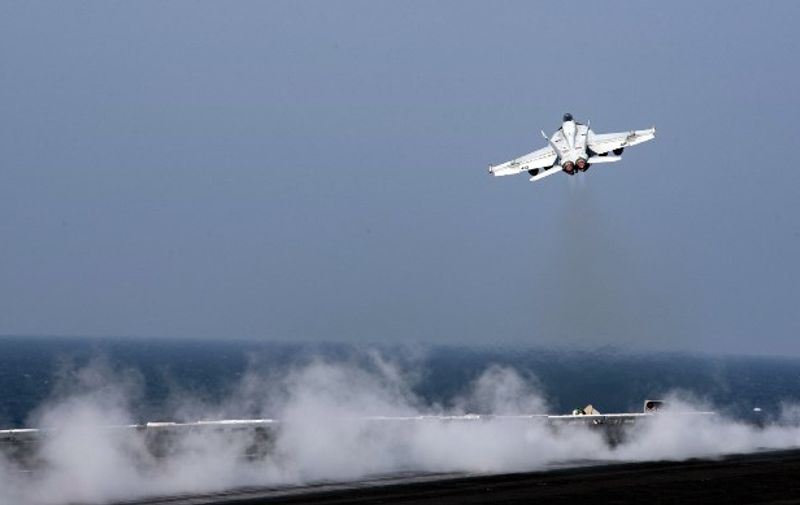 This US Navy photo released October 21, 2016 shows an F/A-18E Super Hornet launching from the flight deck of the aircraft carrier USS Dwight D. Eisenhower on October 20, 2016 in the Gulf. 
A US F/A-18E Super Hornet shot down a Syrian regime plane on June 18, 2017, after it dropped bombs on US-backed forces fighting the Islamic State group in northern Syria, the US-led coalition said. / AFP PHOTO / Navy Media Content Operations (N / Petty Officer 3rd class Nathan T. BEARD / RESTRICTED TO EDITORIAL USE - MANDATORY CREDIT "AFP PHOTO / US NAVY/PETTY OFFICER 3RD CLASS NATHAN T. BEARD" - NO MARKETING NO ADVERTISING CAMPAIGNS - DISTRIBUTED AS A SERVICE TO CLIENTS