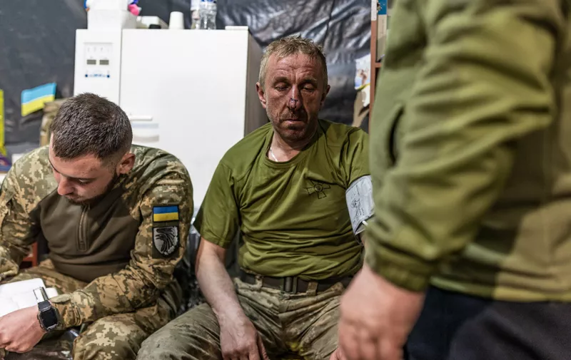 DONETSK OBLAST, UKRAINE - MAY 05: Ukrainian army medics from the 93rd Mechanized Brigade (Kholodnyi Yar) treat wounded soldiers at a stabilisation point near Bakhmut frontline, Donetsk Oblast, Ukraine on May 5, 2023. Diego Herrera Carcedo / Anadolu Agency/ABACAPRESS.COM,Image: 774274893, License: Rights-managed, Restrictions: , Model Release: no