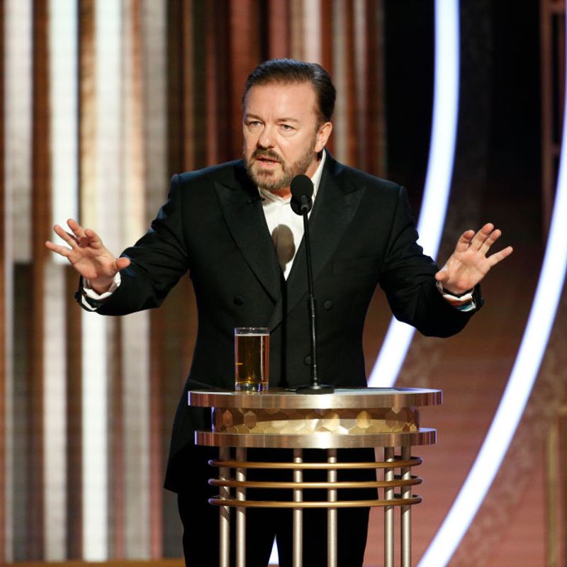BEVERLY HILLS, CALIFORNIA - JANUARY 05: In this handout photo provided by NBCUniversal Media, LLC,  host Ricky Gervais speaks onstage during the 77th Annual Golden Globe Awards at The Beverly Hilton Hotel on January 5, 2020 in Beverly Hills, California. (Photo by Paul Drinkwater/NBCUniversal Media, LLC via Getty Images)