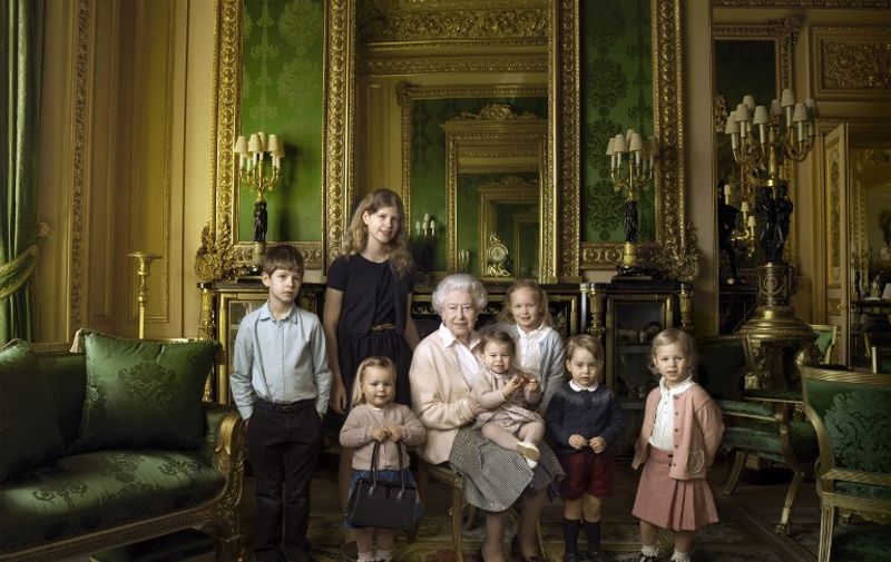 EDITORS NOTE - EMBARGOED, RELEASABLE ON APRIL 21, 2016 at 0001 GMT - THIS RESTRICTION APPLIES TO ALL MEDIA, INCLUDING WEBSITES
This handout portrait picture taken by US photographer Annie Liebovitz shows Queen Elizabeth II (C) posing with her two grandchildren, James, Viscount Severn (L) and Lady Louise (2L) and her five great-grandchildren Mia Tindall (holding handbag), Savannah Philipps (3R), Isla Phillips (R), Prince George (2R) and Princess Charlotte (C) in the Green Drawing room at Windsor Castle in Windsor. 
This picture is one of three official photographs released by Buckingham Palace to mark Queen Elizabeth II's 90th birthday. / AFP PHOTO / ANNIE LIEBOVITZ / Annie Leibovitz / EDITORS NOTE - EMBARGO, RELEASABLE ON APRIL 21, 2016 at 0001 GMT - THIS RESTRICTION APPLIES TO ALL MEDIA, INCLUDING WEBSITES
RESTRICTED TO EDITORIAL USE - MANDATORY CREDIT "AFP PHOTO / 2016 ANNIE LIEBOVITZ " - NO MARKETING NO ADVERTISING CAMPAIGNS - DISTRIBUTED AS A SERVICE TO CLIENTS - NOT TO BE USED AFTER MAY 12, 2016

 /