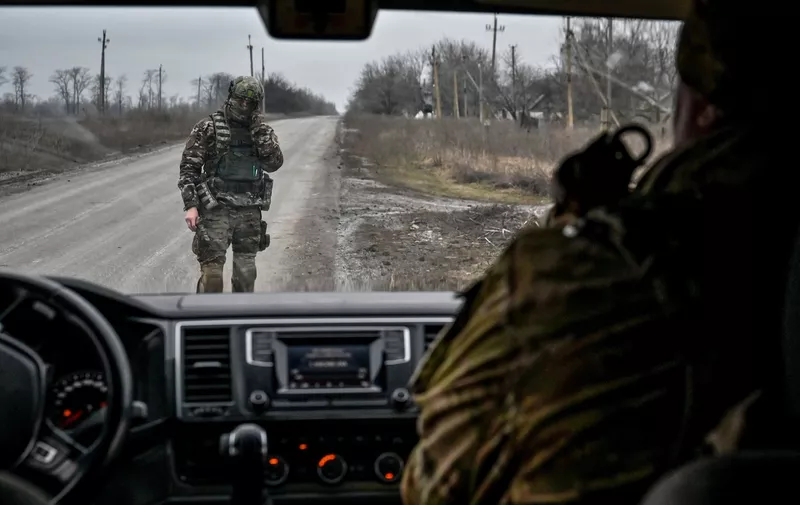 ZALIZNYCHNE, UKRAINE - JANUARY 14, 2023 - A serviceman talks on the phone as he stands on the road in Zaliznychne village, Zaporizhzhia Region, southeastern Ukraine.
Russian troops attack Huliaipole community with incendiary weapons, Zaliznychne, Ukraine - 14 Jan 2023,Image: 749994919, License: Rights-managed, Restrictions: NO USE RUSSIA. NO USE BELARUS., Model Release: no