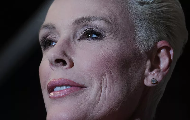 Danish model and actress Brigitte Nielsen poses for photographers during the launch of her autobiography, 'You Only Get One Life' during the London Book Fair at Earls Court in London, on April 11, 2011. AFP PHOTO / BEN STANSALL (Photo by BEN STANSALL / AFP)