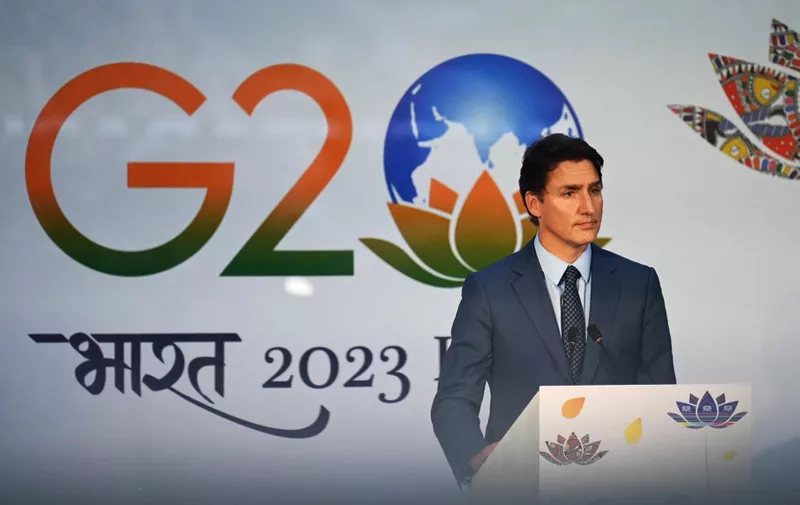 (FILES) Canada's Prime Minister Justin Trudeau attends a press conference after the closing session of the G20 summit in New Delhi on September 10, 2023. Canada on September 18, 2023, accused India's government of involvement in the killing of a Canadian Sikh leader near Vancouver last June, and expelled New Delhi's intelligence chief in Ottawa in retaliation. The diplomatic move sent relations between Ottawa and New Delhi, already sour, to a dramatic new low. Prime Minister Justin Trudeau told an emergency session of the parliamentary opposition at mid-afternoon that his government had "credible allegations" linking Indian agents to the slaying of an exiled Sikh leader, Hardeep Singh Nijjar, in June in British Columbia. (Photo by Money SHARMA / AFP)