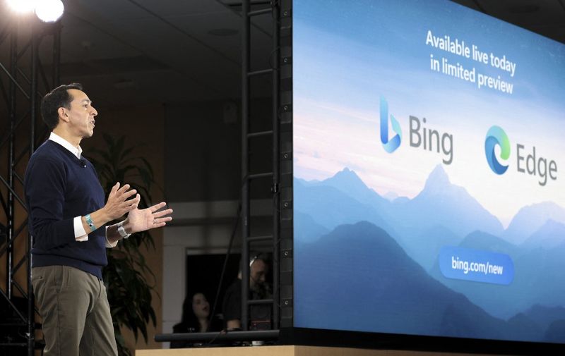 Yusuf Mehdi, Microsoft Corporate Vice President of Modern Life, Search, and Devices speaks during an event introducing a new AI-powered Microsoft Bing and Edge at Microsoft in Redmond, Washington on February 7, 2023. - Microsoft's long-struggling Bing search engine will integrate the powerful capabilities of language-based artificial intelligence, CEO Satya Nadella said, declaring what he called a new era for online search. (Photo by Jason Redmond / AFP)