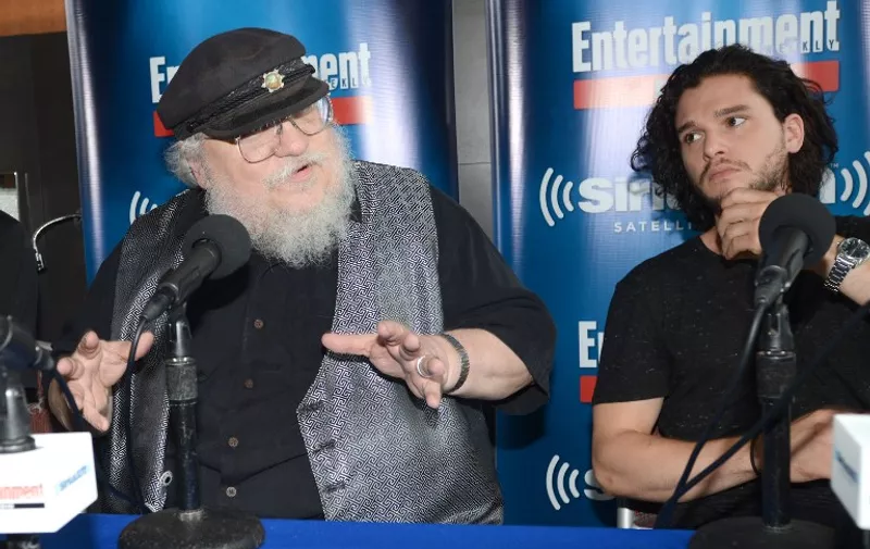 SAN DIEGO, CA - JULY 25: George RR Martin is interviewed on SiriusXM's Entertainment Weekly Radio channel from Comic-Con 2014 at The Hard Rock Hotel on July 25, 2014 in San Diego, California.   Kent C. Horner/Getty Images for Sirius XM/AFP