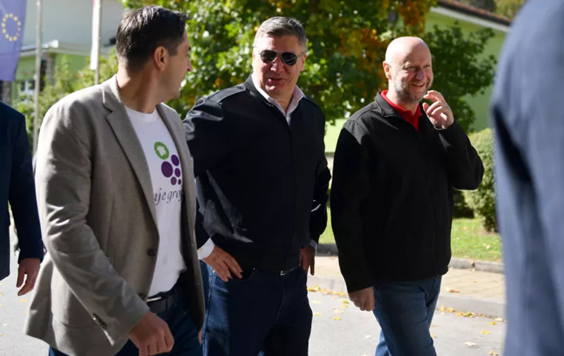 29.9.2024., Pregrada, Hrvatska - Predsjednik Republike Hrvatske, Zoran Milanovic, posjetio je zavrnu svecanost manifestacije 54. Branje grojzdja. Marko Vesligaj, Zoran Milanovic i Zeljko Kolar. Photo: Josip Mikacic/PIXSELL