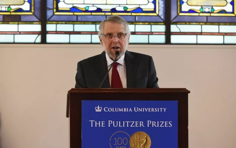 Mike Pride, administrator of The Pulitzer Prizes, announces the 2016 Pulitzer Prize winners at the Columbia University in New York on April 18, 2016.  / AFP PHOTO / Jewel SAMAD