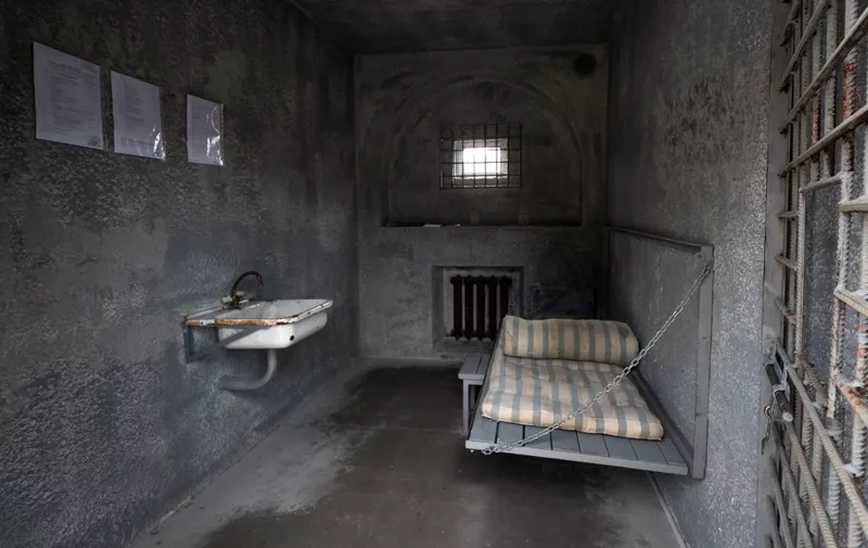 This photograph taken on June 11, 2023 shows a life-size replica of the cell in which Kremlin critic Alexei Navalny is imprisoned, installed on the Place des Nations in Geneva. (Photo by FABRICE COFFRINI / AFP)