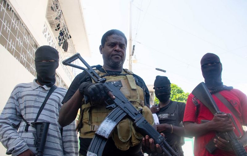 Armed gang leader Jimmy "Barbecue" Cherizier and his men are seen in Port-au-Prince, Haiti, March 5,2024. Haiti's police academy came under attack by an armed gang on March 5, as the tiny Caribbean nation fell into deeper isolation in the wake of an assault on the airport and a deadly prison breakout.
The attack on the academy, where more than 800 cadets are training, was repelled after the arrival of reinforcements, said Lionel Lazarre of the Haitian police union.
The gangs say they want to overthrow the disputed prime minister, Ariel Henry, who was out of the country at the weekend for a trip to Kenya to push for the deployment of a UN-backed multinational police mission to try to stabilize Haiti. (Photo by Clarens SIFFROY / AFP)