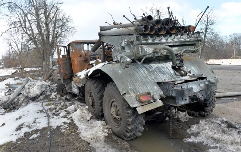 A view shows a destroyed Russian army multiple rocket launcher on the outskirts of Kharkiv on March 16, 2022, amid the ongoing Russia's invasion of Ukraine. (Photo by Sergey BOBOK / AFP)