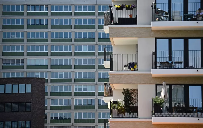 A partial view shows an apartment house with balconies near Heidestrasse in Berlins Mitte (Centre) district in the German capital, on August 14, 2023. Since 2018, the Heidestrasse area of some 85.000 square meters has been constructed with new buildings for housing, working, shopping. (Photo by Tobias SCHWARZ / AFP)