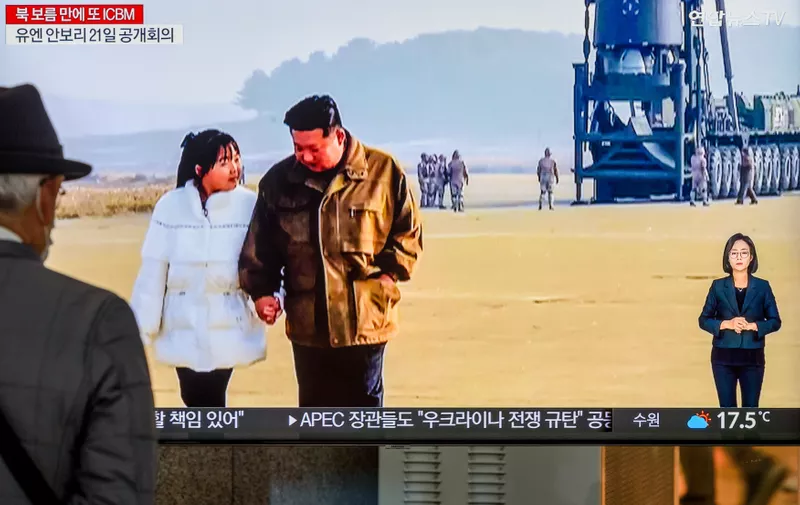 A TV screen shows North Korea's KCNA released pictures of North Korean leader Kim Jong Un and his daughter during a news program at the Yongsan Railway Station in Seoul, South Korea. North Korean leader Kim Jong-un declared a resolute nuclear response to threats by the United States during an on-site inspection of the country's test-firing of a Hwasong-17 intercontinental ballistic missile (ICBM) earlier this week, Pyongyang's state media said 19 November.
The missile, launched from Pyongyang International Airport, flew 999.2 kilometers for 4,135 seconds at an apogee of 6,040.9km and landed in the international waters of the East Sea, according to the Korean Central News Agency (KCNA).
The KCNA released several photos that showed his daughter in a white winter jacket and black pants standing and walking together with Kim in front of the missile that sat on a launch truck. The daughter was also seen along with her mother, Ri Sol-Ju, watching her father as he instructed military officials.
It marked her first official appearance in state media.
Kim Jong Un Inspects Hwasong-17 ICBM Test Launch, Declares Resolute Nuclear Response to Threats - 19 Nov 2022,Image: 738659400, License: Rights-managed, Restrictions: , Model Release: no