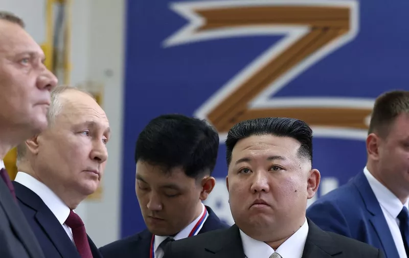 This pool image distributed by Sputnik agency shows Russian President Vladimir Putin (2nd L)and North Korea's leader Kim Jong Un (R) visiting the Vostochny Cosmodrome in Amur region on September 13, 2023, ahead of planned talks that could lead to a weapons deal. (Photo by Vladimir SMIRNOV / POOL / AFP)