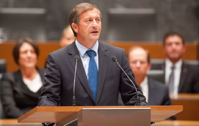 Karl Erjavec, Slovenia's Foreign Minister is sworn in after parliament appointed new centre-left Miro Cerar's government in Ljubljana, Slovenia on September 18, 2014. Slovenian newly appointed centre-left Prime Minister Miro Cerar announced a restrictive financial policy and further privatisations as parliament approved his cabinet today. The 16-member cabinet was approved with 54 against 25 votes in the 90-seat parliament. Six MPs abstained. AFP PHOTO / Jure Makovec / AFP PHOTO / Jure Makovec