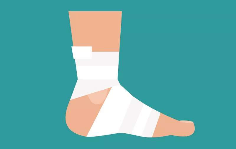 Illustration of a bandaged foot on a blue background