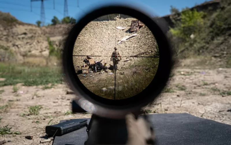 DONETSK OBLAST, UKRAINE - AUGUST 9: A view from the viewfinder of a Ukrainian sniper rifle at a shooting range amid Russia and Ukraine war in Donetsk Oblast, Ukraine on August 09, 2023. Ignacio Marin / Anadolu Agency (Photo by Ignacio Marin / ANADOLU AGENCY / Anadolu Agency via AFP)