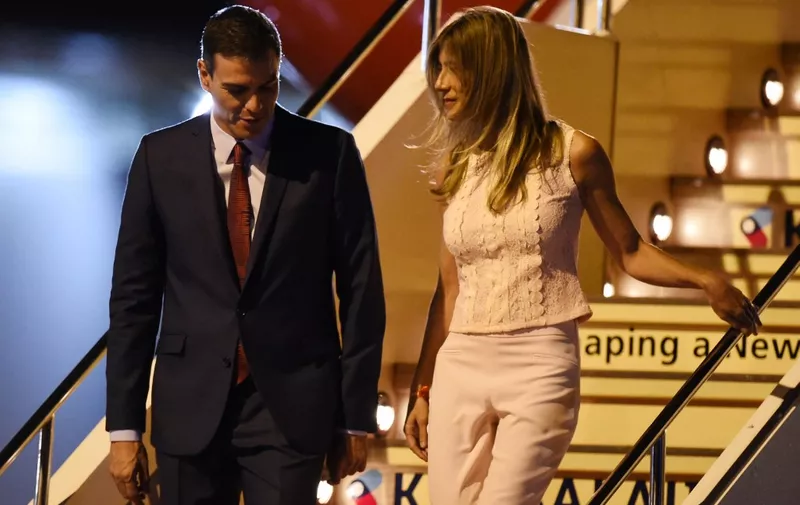 Spain's Prime Minister Pedro Sanchez and his wife Begona Sanchez arrive at Kansai airport in Izumisano city, Osaka prefecture, on June 27, 2019 ahead of the G20 Osaka Summit. (Photo by CHARLY TRIBALLEAU / AFP)