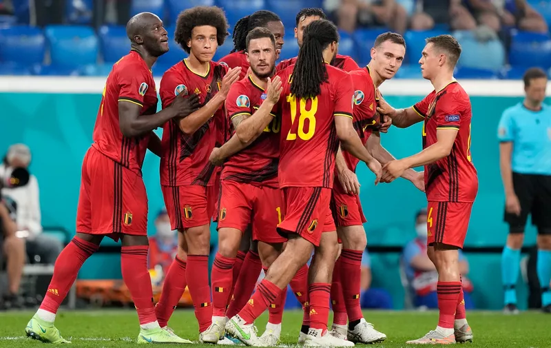 Belgium players celebrate the opening goal of their team during the Euro 2020 soccer championship group B match between Finland and Belgium at Saint Petersburg stadium, in St. Petersburg, Russia, Monday, June 21, 2021. (AP Photo/Dmitri Lovetsky, Pool)