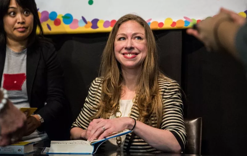 NEW YORK, NY - SEPTEMBER 15: Chelsea Clinton signs copies of her new book, "It's Your World," at Barnes and Noble on September 15, 2015 in New York City. The book, which is her first, is aimed at 10-14 year olds and encourages them to be active about issues they are passionate about.   Andrew Burton/Getty Images/AFP