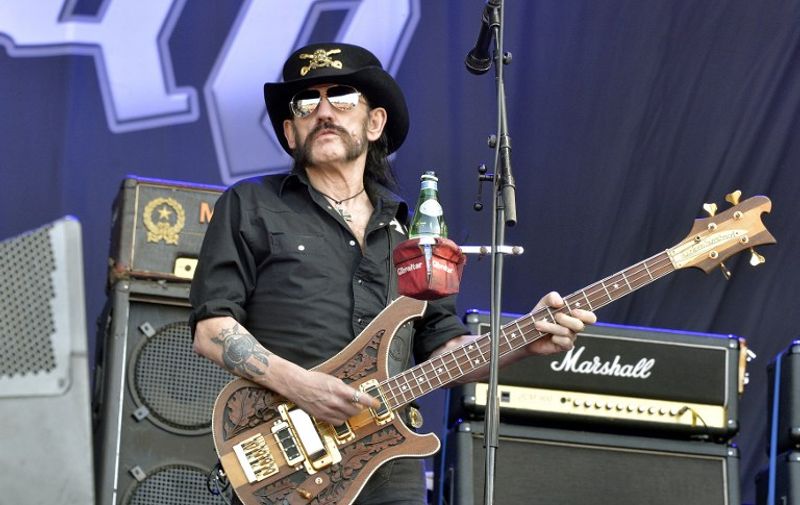 (FILES) This file photo taken on June 19, 2015 shows Motorhead's singer and bassist, Lemmy Kilmister, performing during the Hellfest heavy metal and hard rock music festival Hellfest in Clisson, near Nantes, western France. Ian "Lemmy" Kilmister, the frontman of iconic British heavy metal band Motorhead, has died aged 70 of a sudden, aggressive cancer, the group said on December 29, 2015.    AFP PHOTO / FILES / GEORGES GOBET / AFP / GEORGES GOBET
