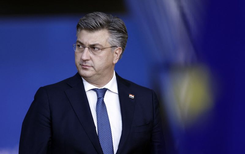 Croatia's Prime Minister Andrej Plenkovic arrives for the first day of a EU leaders Summit at The European Council Building in Brussels on October 20, 2022. (Photo by Kenzo TRIBOUILLARD / AFP)