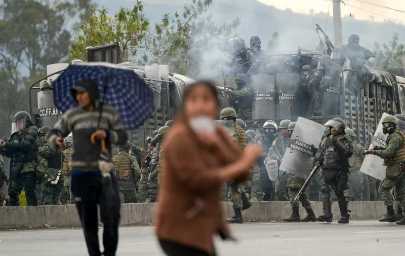 Ecuadorean security forces clash with indigenous people and peasants protesting against the economic policies of the government of Ecuador's President Lenin Moreno regarding the agreement signed on March with the International Monetary Fund (IMF) in the outskirts of Quito on October 7, 2019.
 Ecuador has been rocked by days of demonstrations in response to increases of up to 120 percent in fuel prices, which came into force on October 3, after the government scrapped subsidies as part of an agreement with the International Monetary Fund to obtain loans despite its high public debt., Image: 475493646, License: Rights-managed, Restrictions: , Model Release: no, Credit line: RODRIGO BUENDIA / AFP / Profimedia