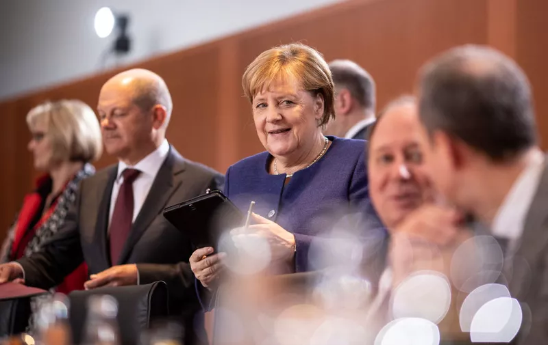 BERLIN, GERMANY - JANUARY 08: German Chancellor Angela Merkel (CDU) and Finance Minister and Vice Chancellor Olaf Scholz
arrive to a first government cabinet meeting of 2020 in the German Chancellery on January 08, 2020 in Berlin, Germany. (Photo by Maja Hitij/Getty Images)