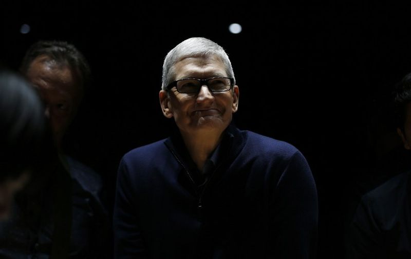 CUPERTINO, CA - OCTOBER 27: Apple CEO Tim Cook smiles during a product launch event on October 27, 2016 in Cupertino, California. Apple Inc. unveiled the latest iterations of its MacBook Pro line of laptops and TV app.   Stephen Lam/Getty Images/AFP