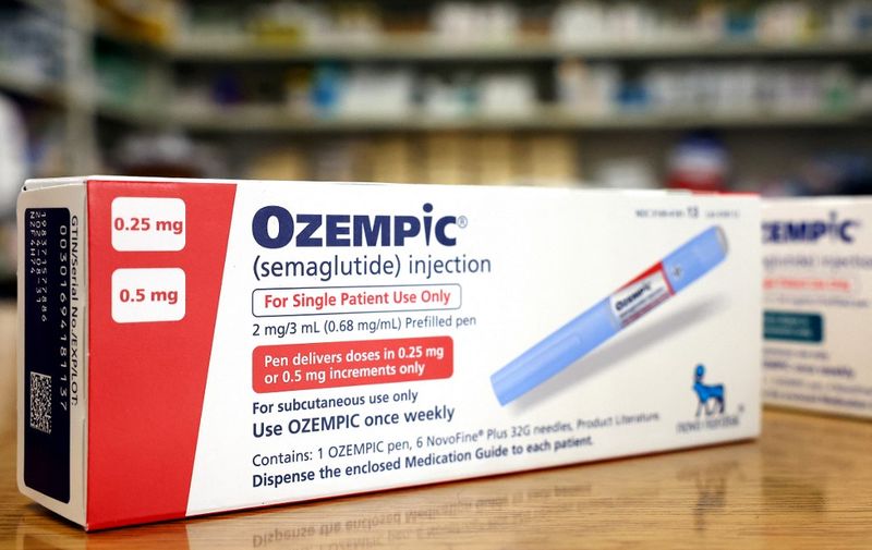 LOS ANGELES, CALIFORNIA - APRIL 17: In this photo illustration, boxes of the diabetes drug Ozempic rest on a pharmacy counter on April 17, 2023 in Los Angeles, California. Ozempic was originally approved by the FDA to treat people with Type 2 diabetes- who risk serious health consequences without medication. In recent months, there has been a spike in demand for Ozempic, or semaglutide, due to its weight loss benefits, which has led to shortages. Some doctors prescribe Ozempic off-label to treat obesity. (Photo illustration by Mario Tama/Getty Images) (Photo by MARIO TAMA / GETTY IMAGES NORTH AMERICA / Getty Images via AFP)