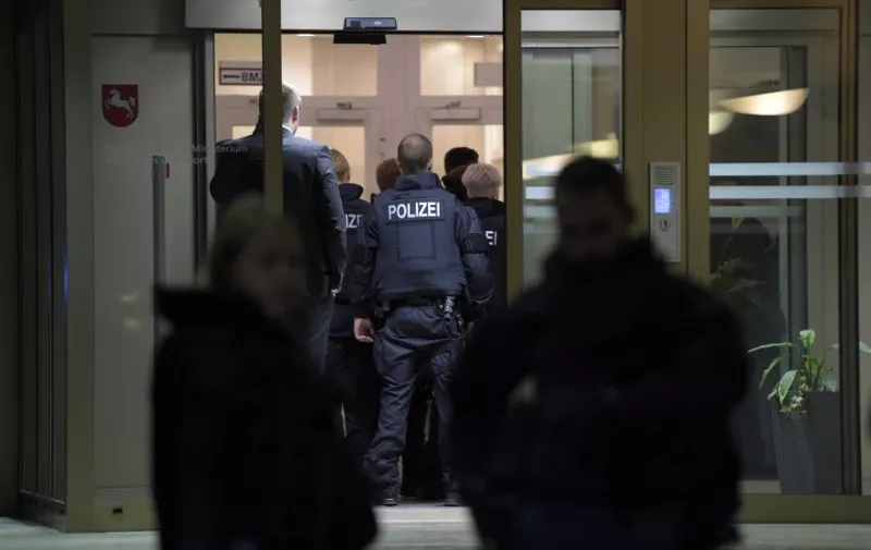 Police enters the Interior ministry of Lower Saxony after the friendly football match Germany vs the Netherlands was called off for 'security reasons', in Hannover on November 17, 2015.   AFP PHOTO / ODD ANDERSEN