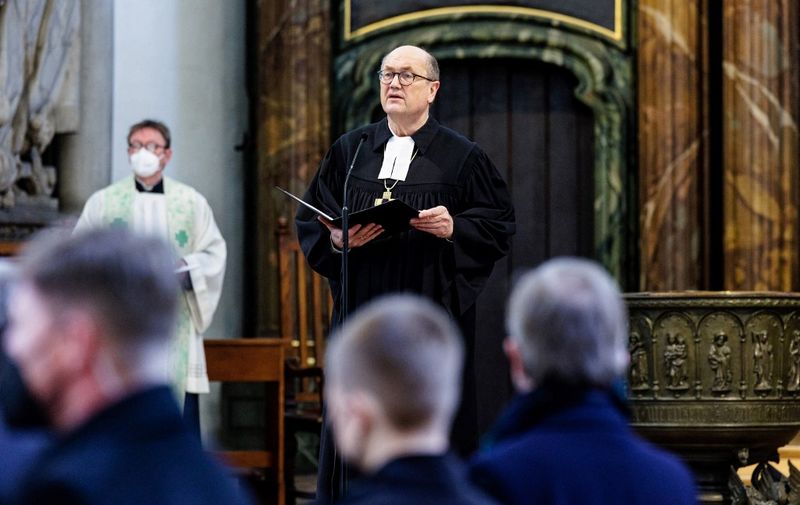 Representative of the Council of the Evangelical Church in Germany (EKD) Martin Dutzmann addresses guests at an ecumenical service on February 13, 2022 at the St Mary's Church (Marienkirche) in Berlin, prior to the election of Germany's President by the Federal Convention. - German President Steinmeier is poised to be re-elected for a second straight term, after gaining a reputation as a tireless defender of democratic values at a time when resurging far-right extremism and the coronavirus pandemic were putting them to the test. The president is voted for by the Federal Convention, a one-off assembly made up of MPs and an equal number of state delegates, taking the total number close to 1,500. (Photo by Jens Schlueter / POOL / AFP)