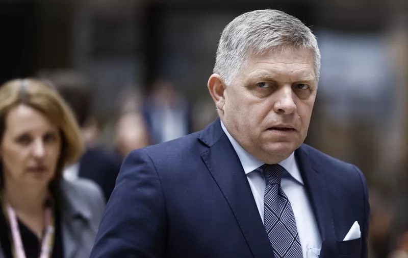 Slovakia's Prime Minister Robert Fico walks during the European Council summit at the EU headquarters in Brussels, on April 18, 2024. (Photo by KENZO TRIBOUILLARD / AFP)