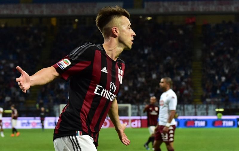 AC Milan's forward Stephan El Shaarawy celebrates after scoring a goal during the Serie A football match between AC Milan and  Torino at San Siro Stadium in Milan on May 24, 2015. AFP PHOTO / GIUSEPPE CACACE