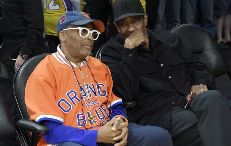 LOS ANGELES, CA - MARCH 12: Spike Lee (L) and Denzel Washington attend the Los Angeles Lakers and the New York Knicks game at Crypto.com Arena on March 12, 2023 in Los Angeles, California. NOTE TO USER: User expressly acknowledges and agrees that, by downloading and or using this photograph, User is consenting to the terms and conditions of the Getty Images License Agreement.   Kevork Djansezian/Getty Images/AFP (Photo by KEVORK DJANSEZIAN / GETTY IMAGES NORTH AMERICA / Getty Images via AFP)