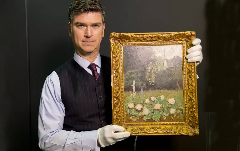A handout picture from the Art Loss Register received on January 7, 2012 shows Christopher Marinello, Executive Director and General Council of the The Art Loss Register, holding "Le Jardin", a Matisse painting that was stolen 25 years ago  after it was retrieved in London on January 3, 2013. The oil on canvas from 1920 which is now worth about 1 million USD (760,000 Euros), was stolen 25 years ago from the Museum of Modern Art in Stockholm has turned up in Britain where a dealer had hoped to sell it on behalf of an elderly Polish client.  AFP PHOTO/HO/ART LOSS REGISTER/RAY WELLS  ==  RESTRICTED TO EDITORIAL USE - MANDATORY CREDIT "AFP PHOTO / ART LOSS REGISTER/RAY WELLS  " - NO MARKETING NO ADVERTISING CAMPAIGNS - DISTRIBUTED AS A SERVICE TO CLIENTS  ==