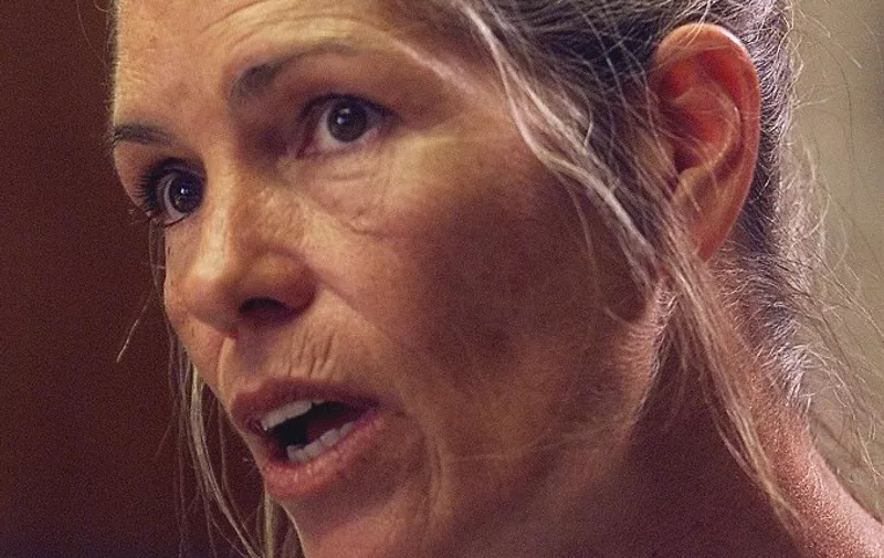 Leslie Van Houten expresses remorse in the killings of the LaBianca couple to members of the Board of Prison Terms commissioners during her parole hearing 28 June 2002 at the California Institution for Women in Corona, Califonia. Van Houten, 52, who has served over 30 years in prison for her involvement in the Tate-La Bianca killings, was denied parole. AFP PHOTO/POOL/Damian DOVARGANES (Photo by DAMIAN DOVARGANES / AP / AFP)
